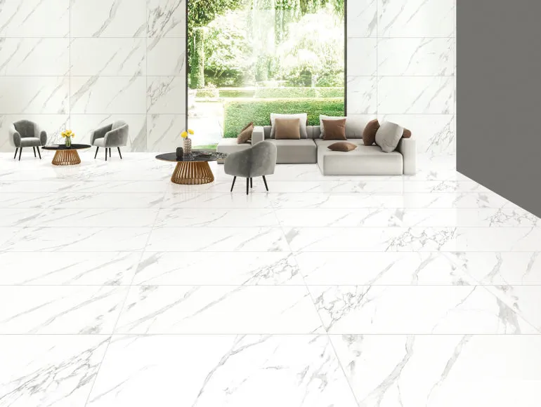 Marble flooring with gold accents for a luxurious living room design